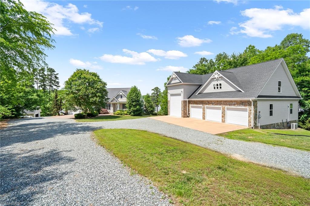 133 Lake View Road Prospect Hill, NC 27314 - Photo 3 of 50 View of driveway and detached garage and house