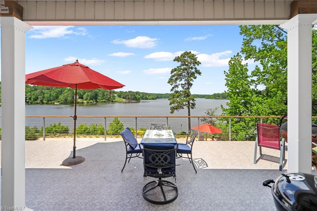 133 Lake View Road Prospect Hill, NC 27314 - Photo 10 of 50 Walk thru the french door to this view of the private lake