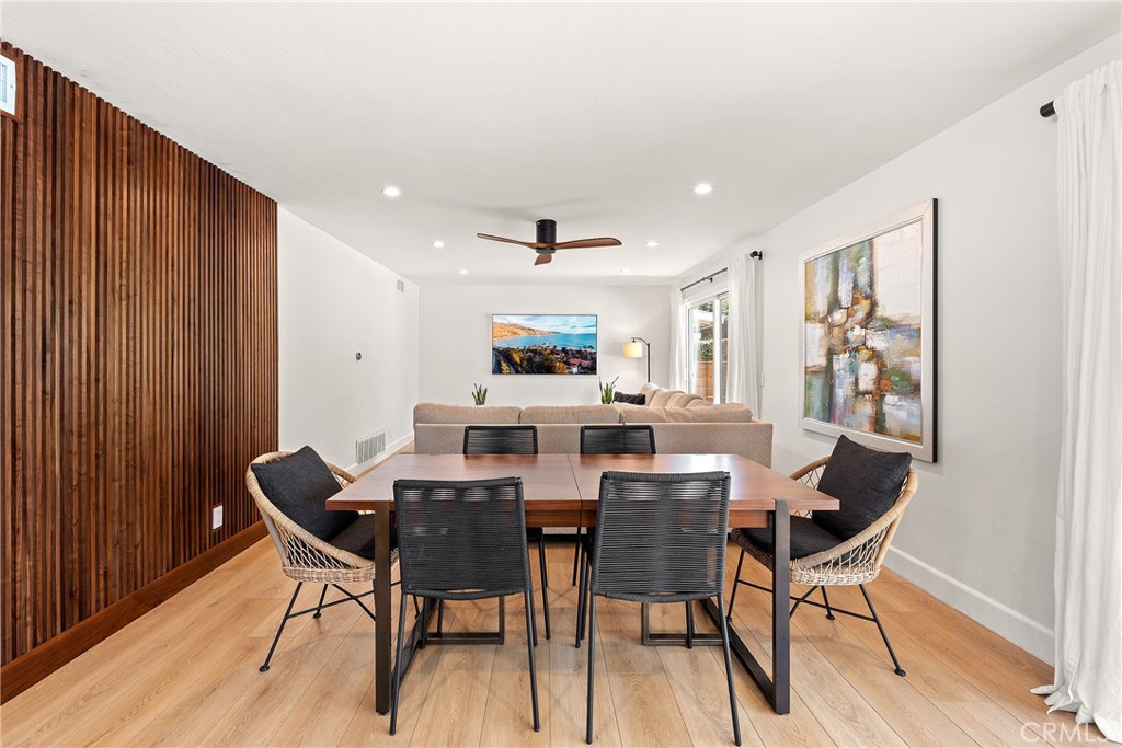 24701 Nympha Drive Mission Viejo, CA 92691 - Photo 26 of 75 a view of a dining room with furniture and wooden floor