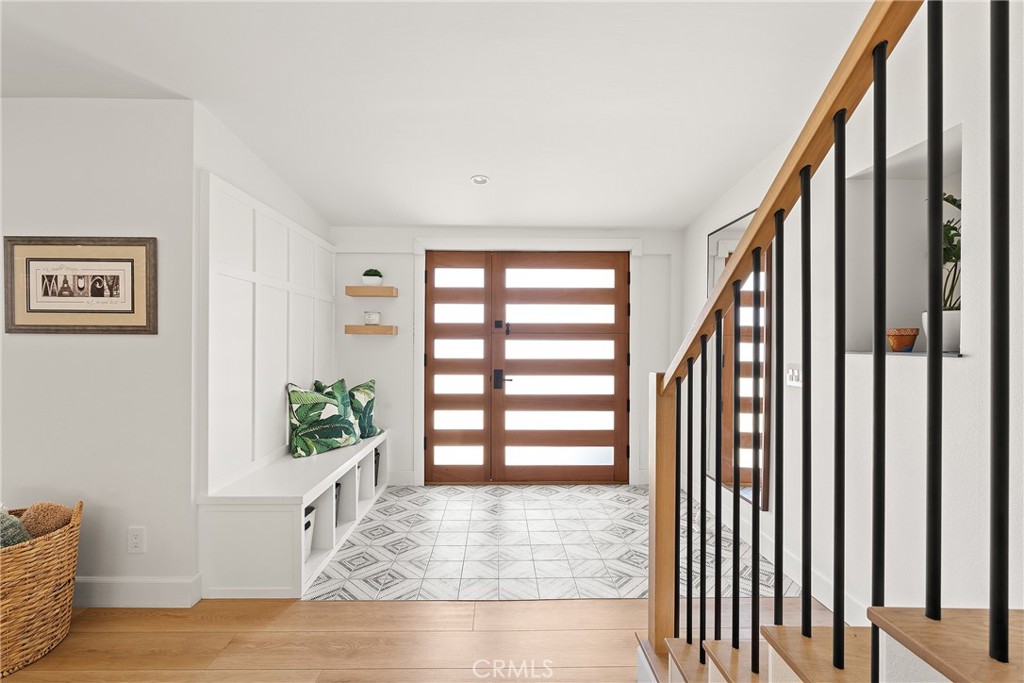 24701 Nympha Drive Mission Viejo, CA 92691 - Photo 3 of 75 a view of an entryway with wooden floor and door