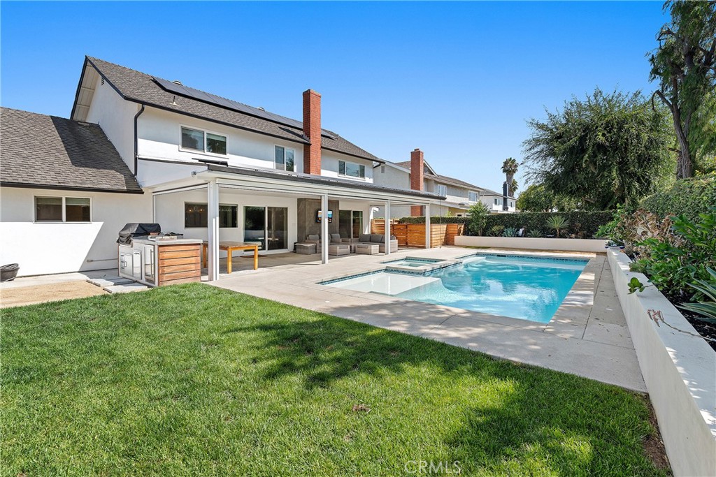 24701 Nympha Drive Mission Viejo, CA 92691 - Photo 35 of 75 a front view of a house with garden