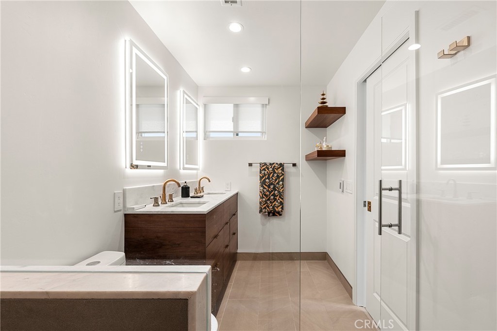 24701 Nympha Drive Mission Viejo, CA 92691 - Photo 49 of 75 a room with a table and chairs