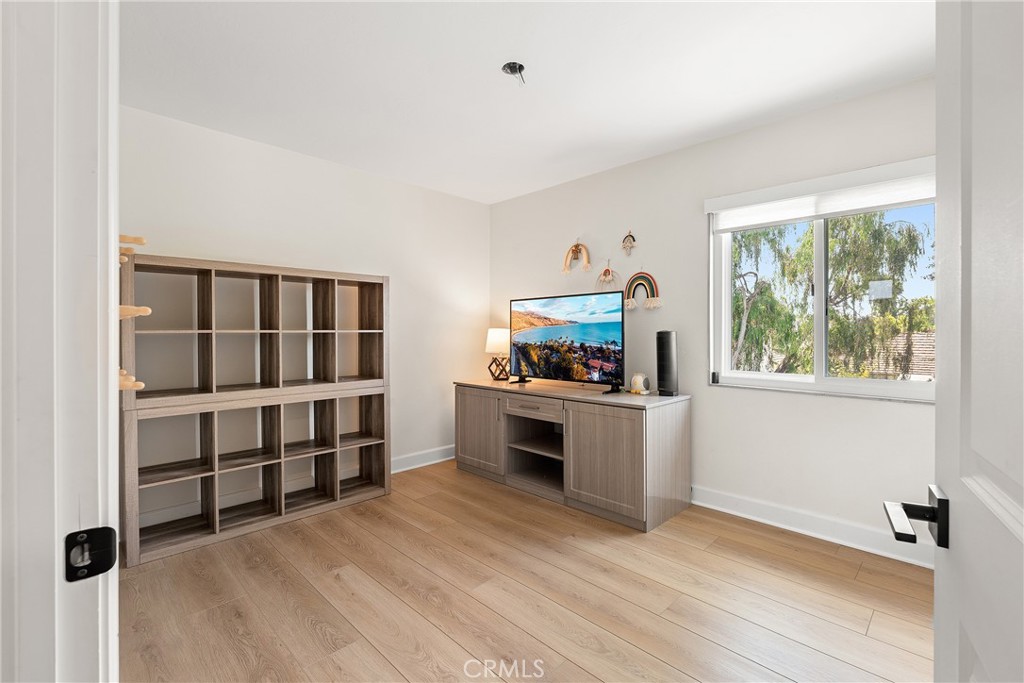 24701 Nympha Drive Mission Viejo, CA 92691 - Photo 58 of 75 a kitchen with stainless steel appliances a stove top oven a sink and a window