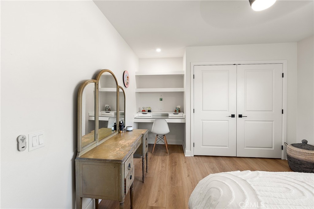 24701 Nympha Drive Mission Viejo, CA 92691 - Photo 63 of 75 a view of a bedroom with a bed and gym equipment