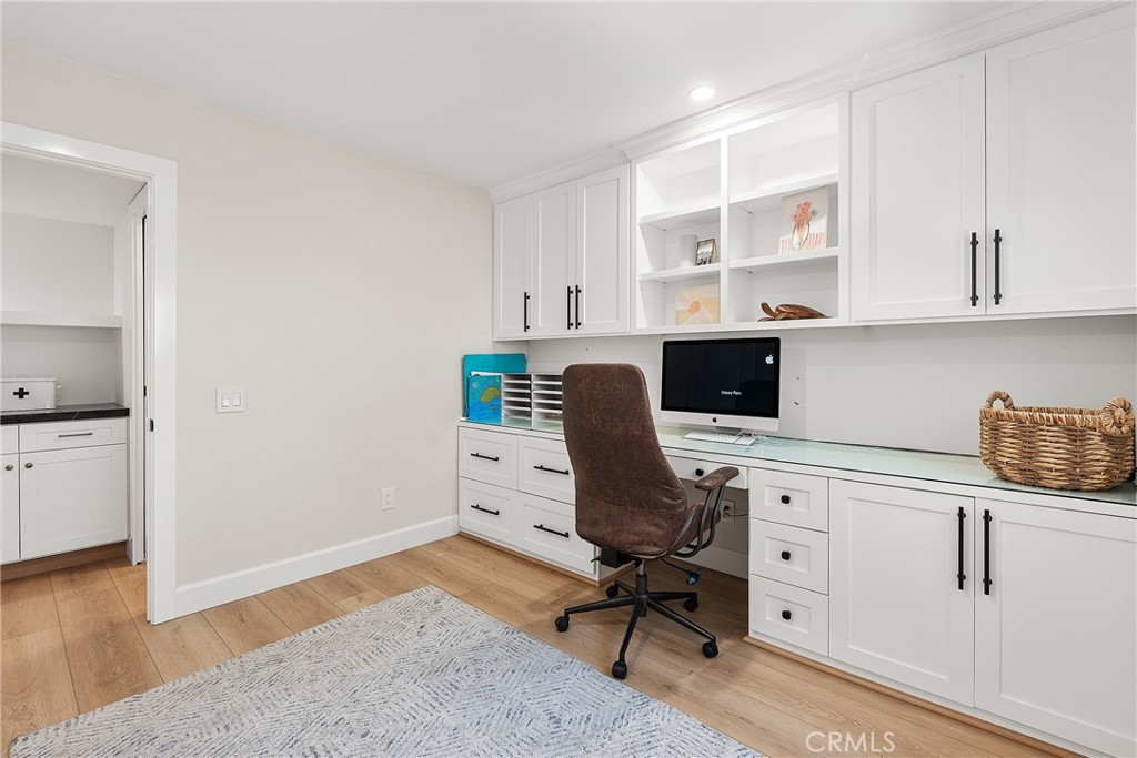 24701 Nympha Drive Mission Viejo, CA 92691 - Photo 66 of 75 a view of a workspace with furniture and wooden floor