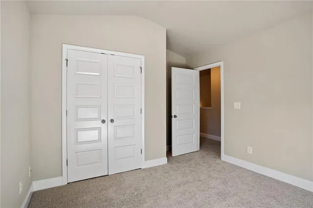 an empty room with closet