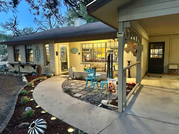a view of a porch with furniture