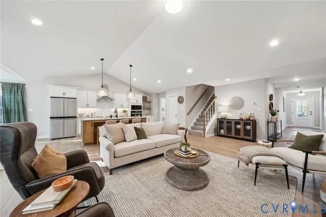 a kitchen with cabinets and stainless steel appliances