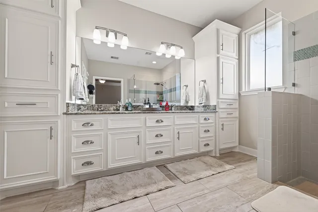 a view of a walk in closet and bedroom