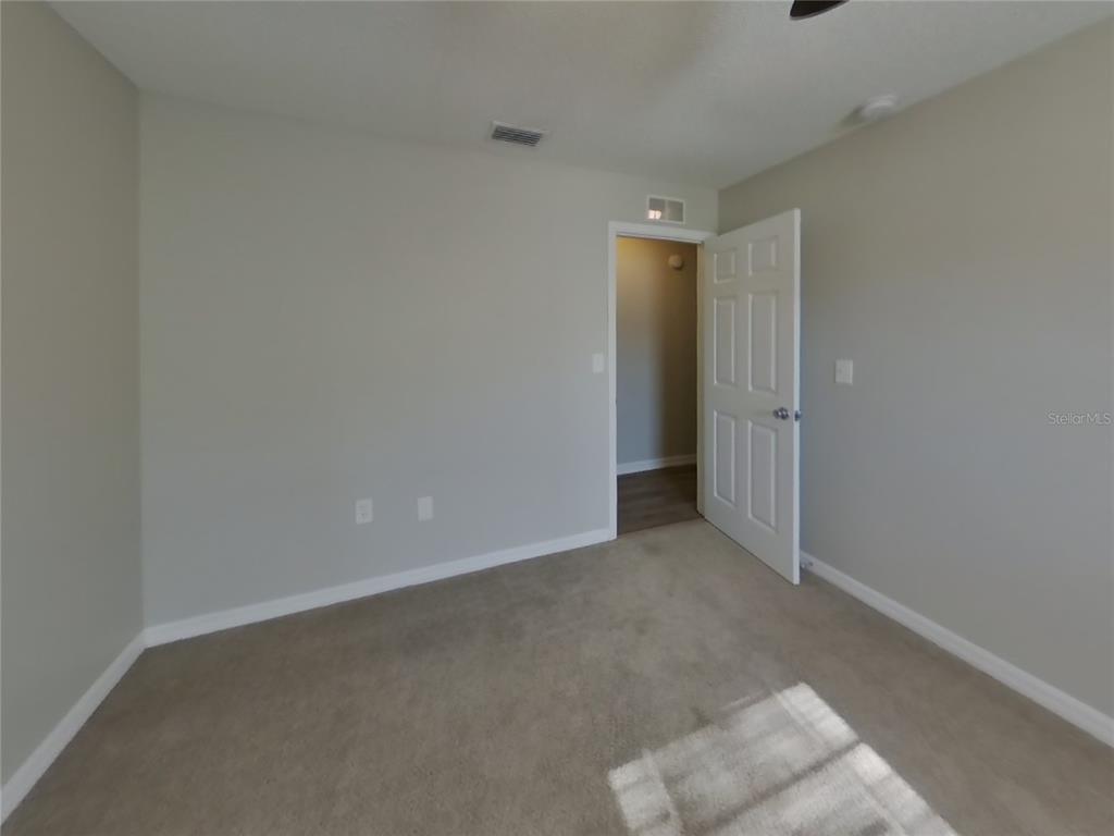 Undisclosed Address Spring Hill, FL 34606 - Photo 12 of 16 a view of hallway