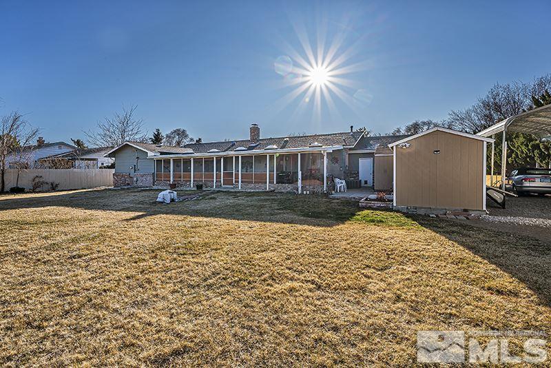 12005 Broken Hill Road Reno, NV 89511 - Photo 19 of 20 a front view of a house with a yard