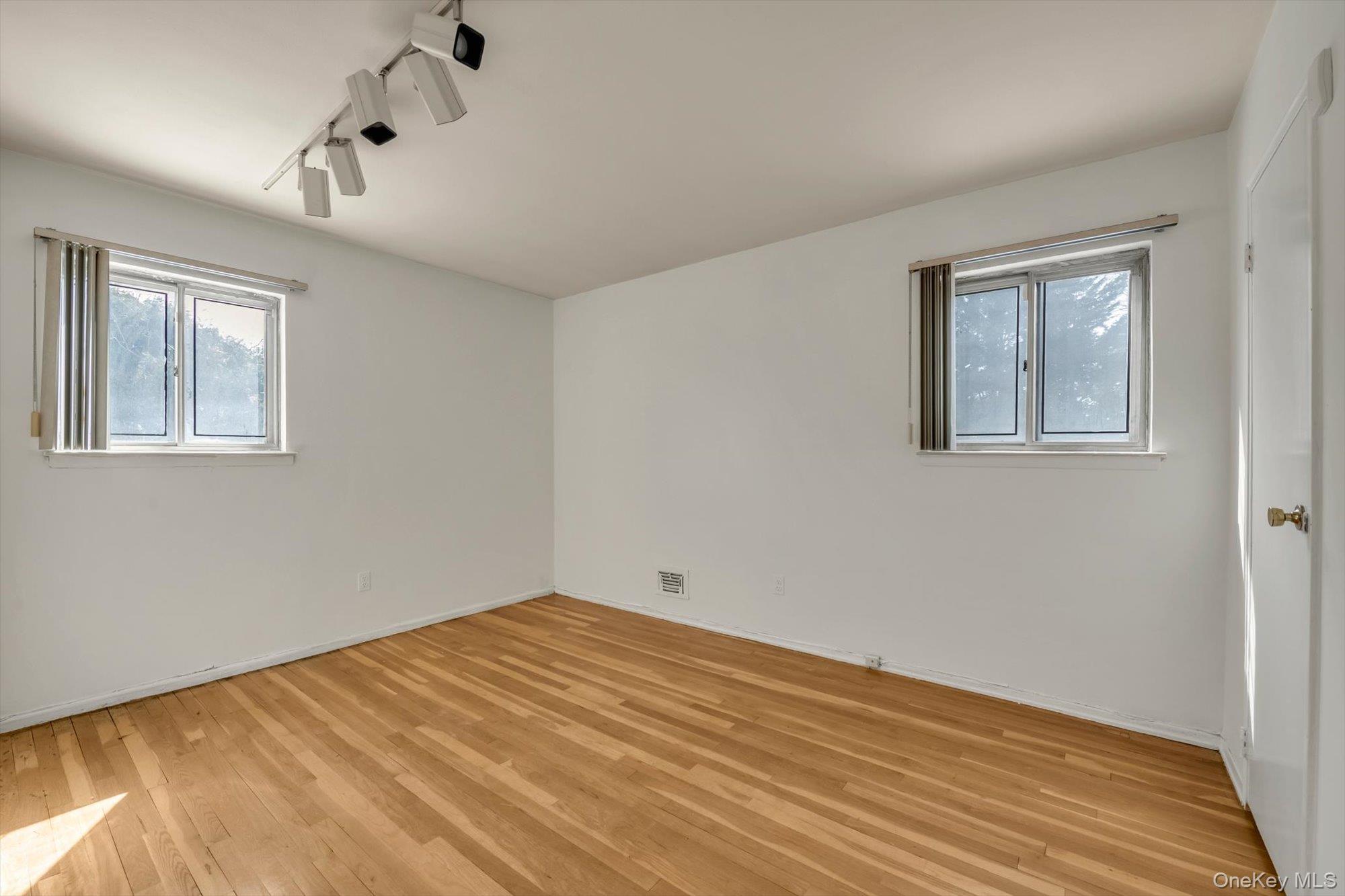 23 Madison Avenue Jericho, NY 11753 - Photo 17 of 29 Bedroom #1 with hardwood floor