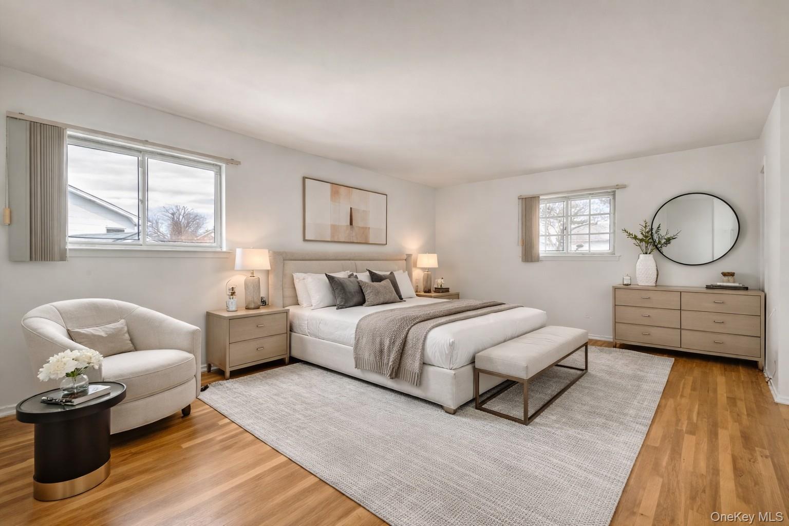 23 Madison Avenue Jericho, NY 11753 - Photo 22 of 29 DIGITALLY STAGED Primary Ensuite Bedroom