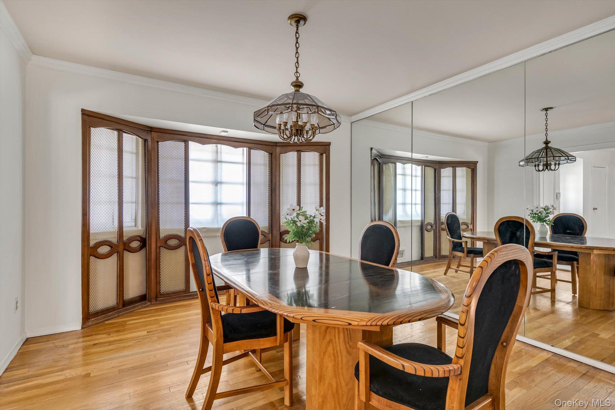 23 Madison Avenue Jericho, NY 11753 - Photo 8 of 29 Spacious dining room with hardwood floors