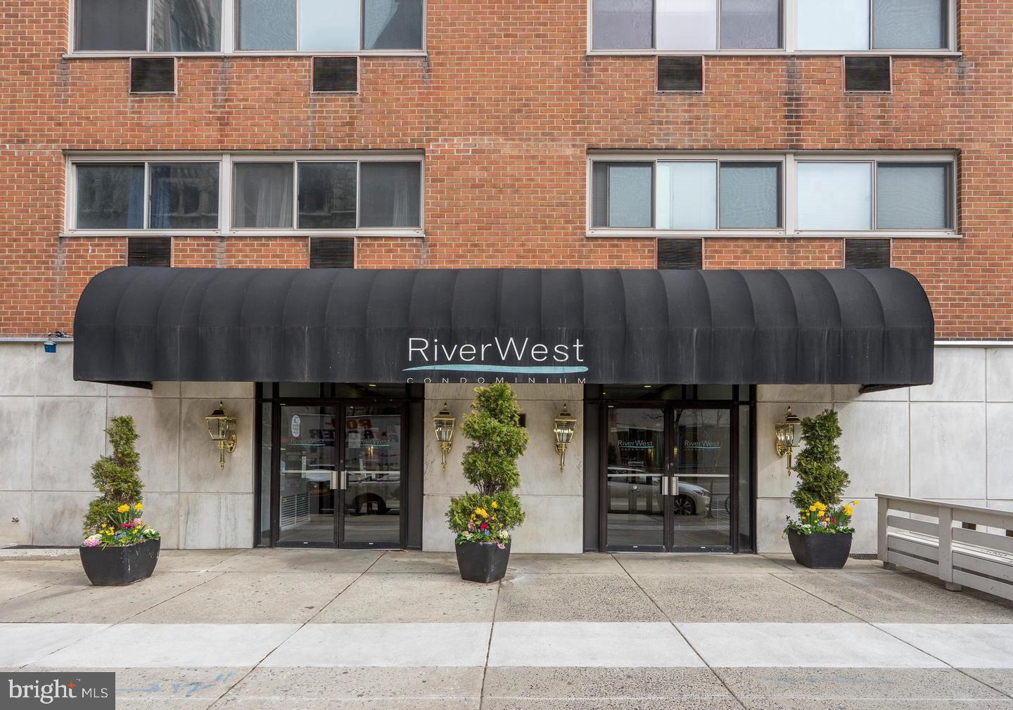 a view of a building with sitting area