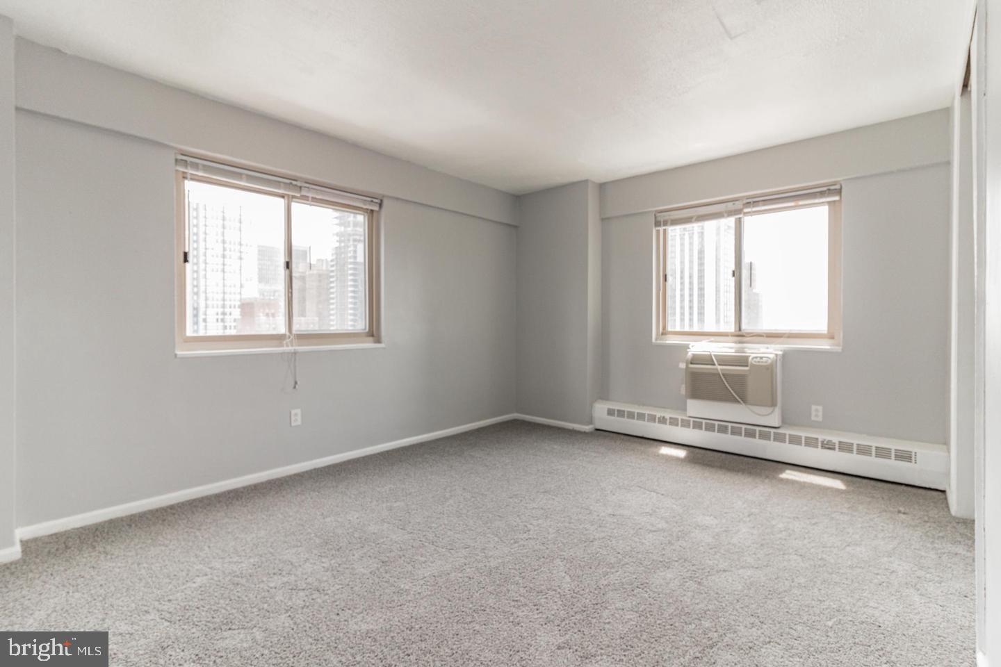 2101-17 Chestnut Street, Unit 1608 Philadelphia, PA 19103 - Photo 14 of 28 an empty room with a window