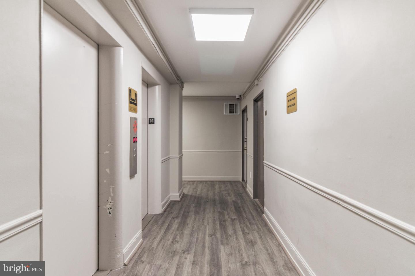 2101-17 Chestnut Street, Unit 1608 Philadelphia, PA 19103 - Photo 4 of 28 a view of hallway with wooden floor