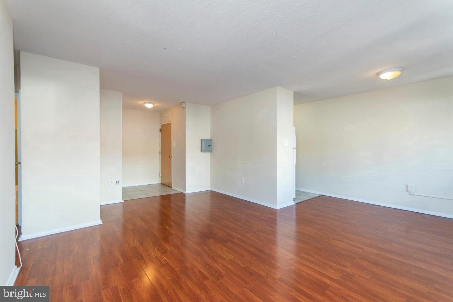 2101-17 Chestnut Street, Unit 1608 Philadelphia, PA 19103 - Photo 6 of 28 a view of an empty room with wooden floor