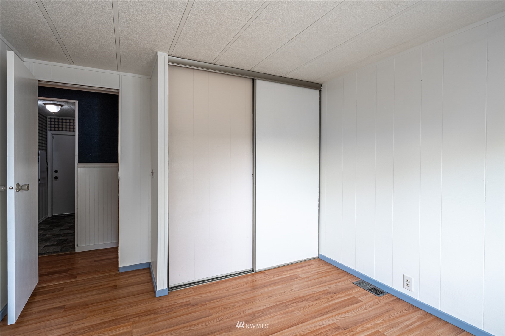35 Apple Acres Road, Unit 112 Chelan, WA 98816 - Photo 18 of 35 a view of an empty room with wooden floor