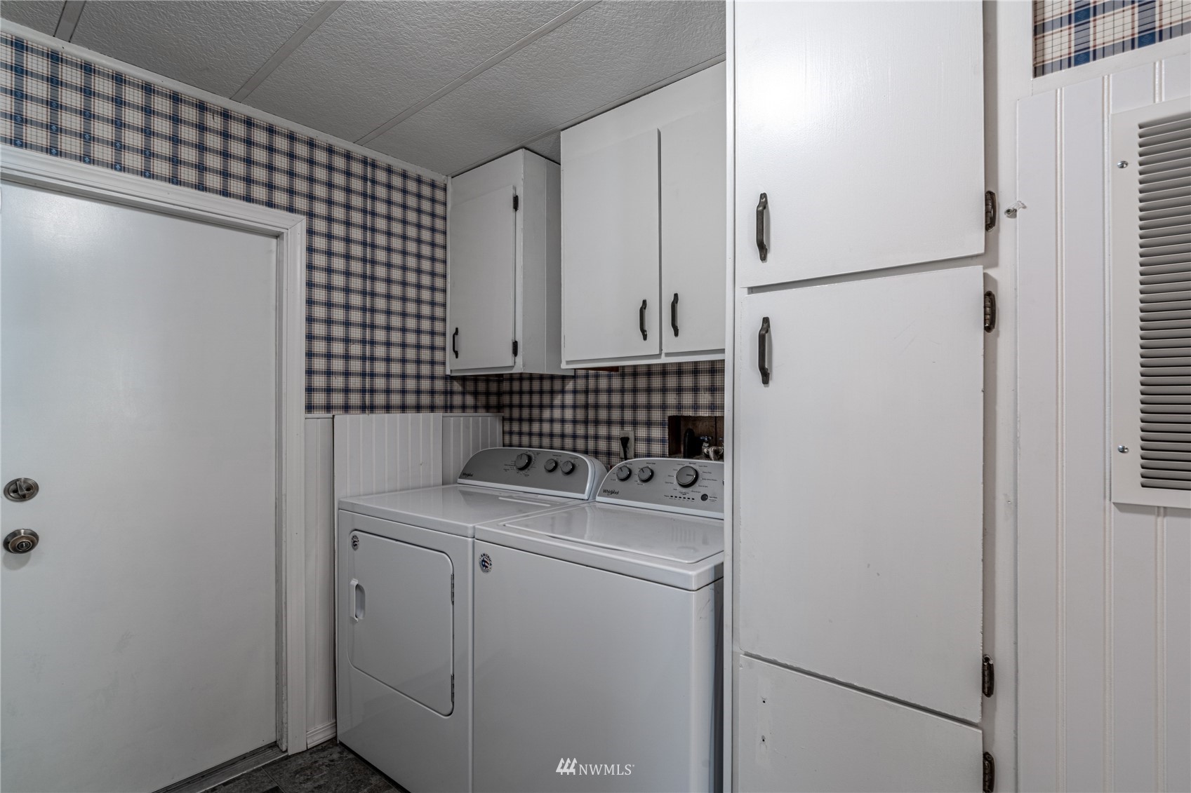 35 Apple Acres Road, Unit 112 Chelan, WA 98816 - Photo 24 of 35 a view of storage and utility room with washer and dryer