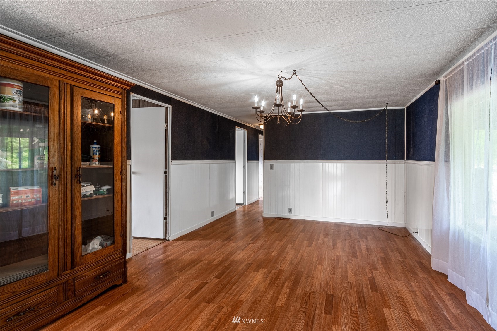 35 Apple Acres Road, Unit 112 Chelan, WA 98816 - Photo 10 of 35 a view of a livingroom with wooden floor