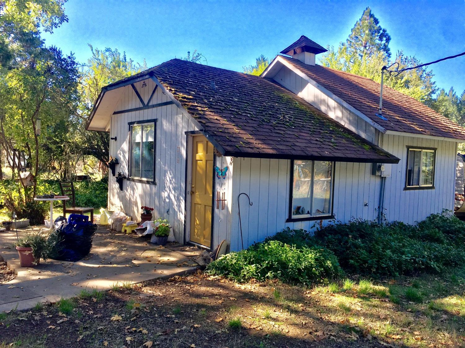 300 Grange Road Grants Pass, OR 97526 - Photo 5 of 27 a front view of a house with a yard