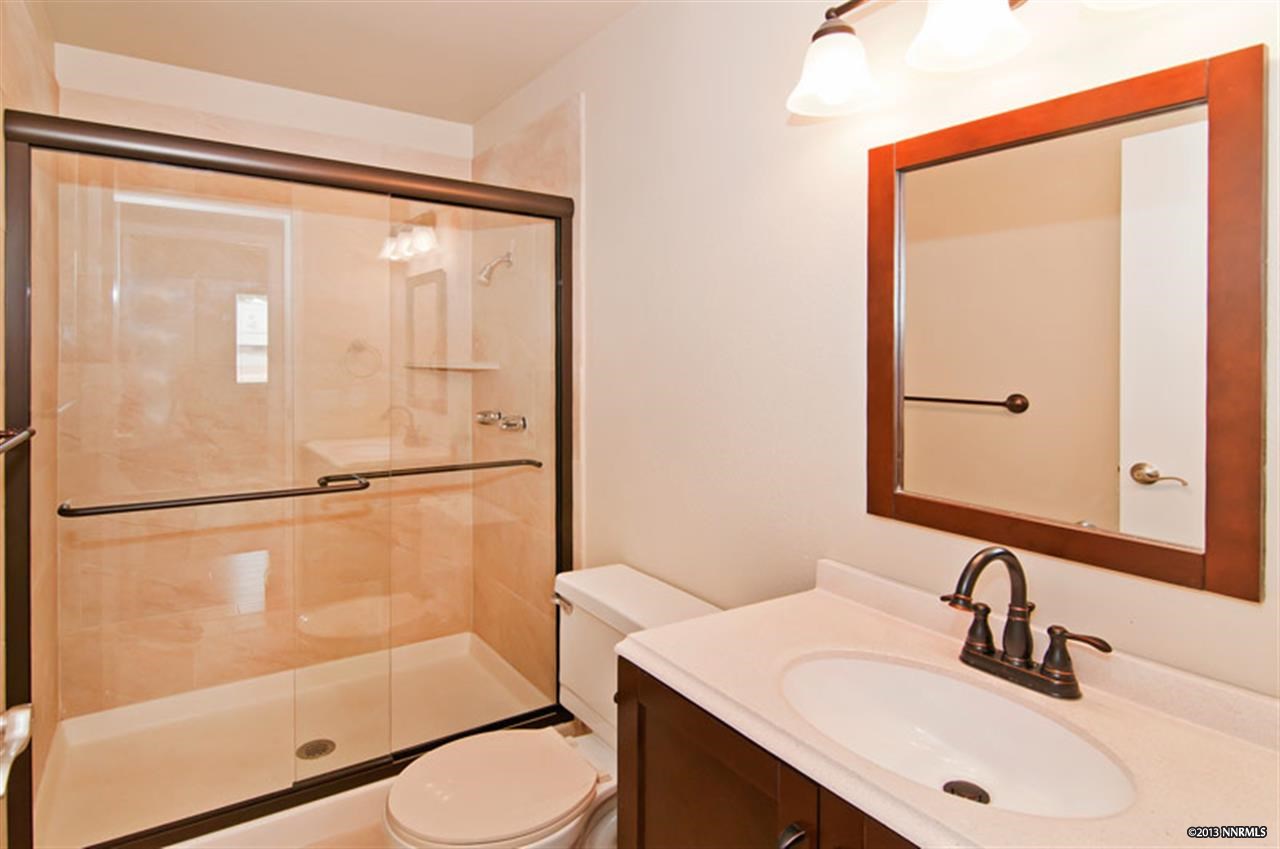1800 Prior Road Reno, NV 89503 - Photo 10 of 10 a bathroom with a sink mirror toilet and shower