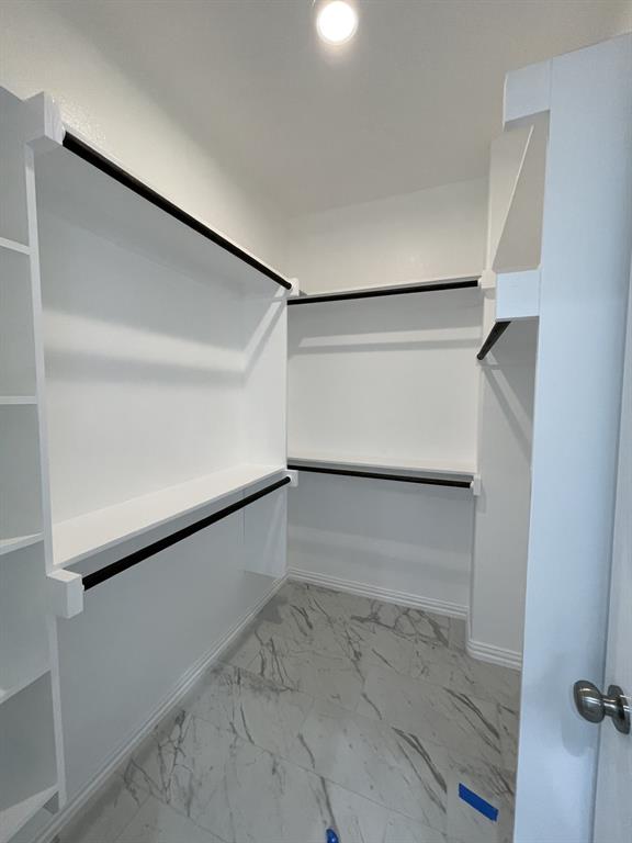 3309 Collin Street Fort Worth, TX 76119 - Photo 12 of 15 a view of an empty walk in closet