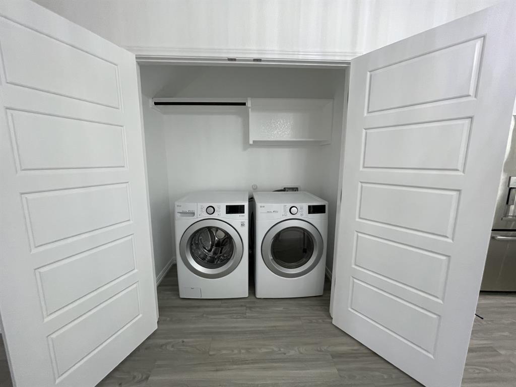 3309 Collin Street Fort Worth, TX 76119 - Photo 5 of 15 a utility room with dryer and washer