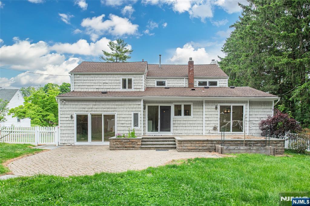 163 Sand Spring Road Morristown, NJ 07960 - Photo 29 of 39 a front view of a house with garden