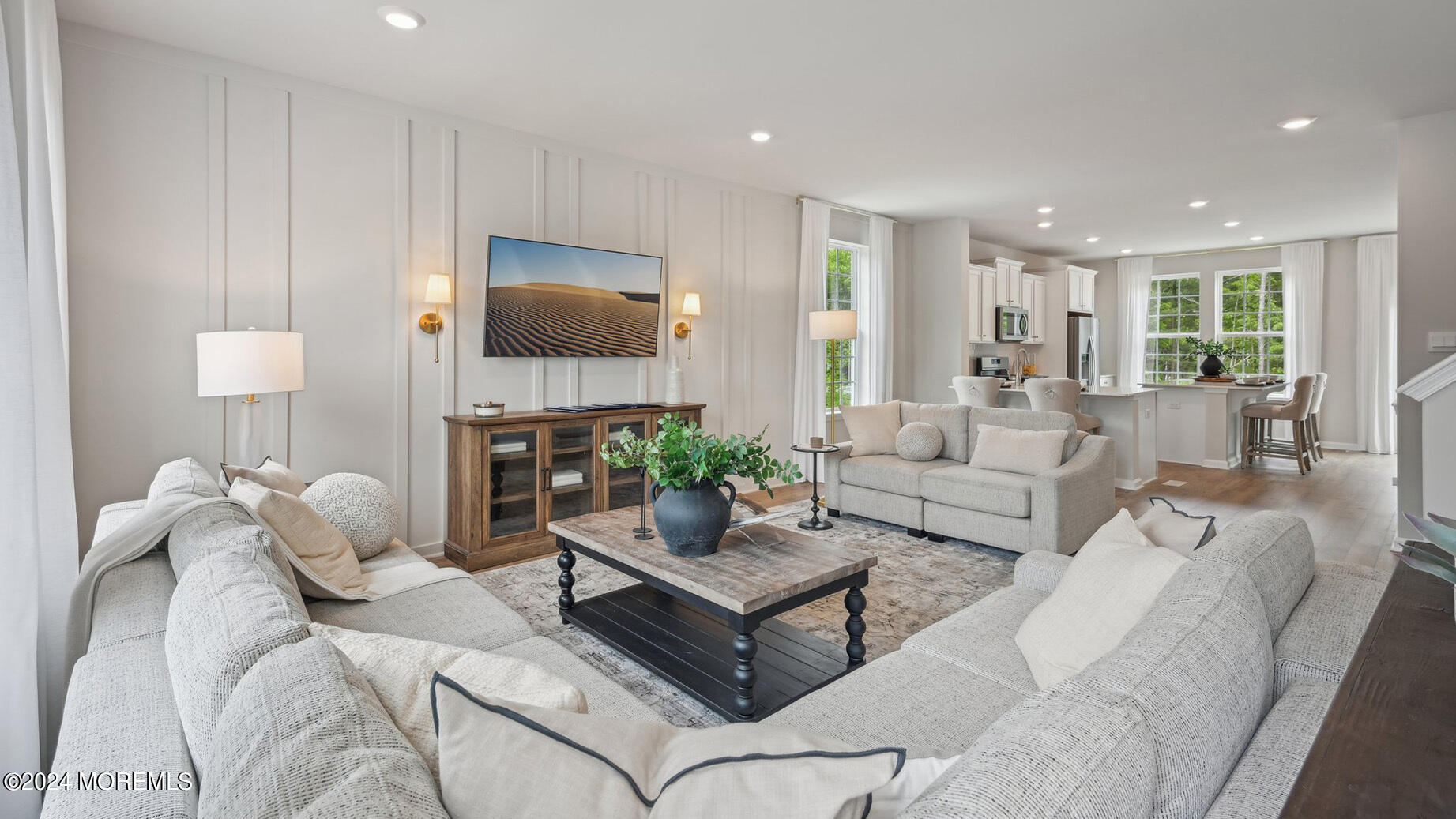 16 Rothbury Court Tinton Falls, NJ 07753 - Photo 11 of 43 a living room with furniture and a lamp