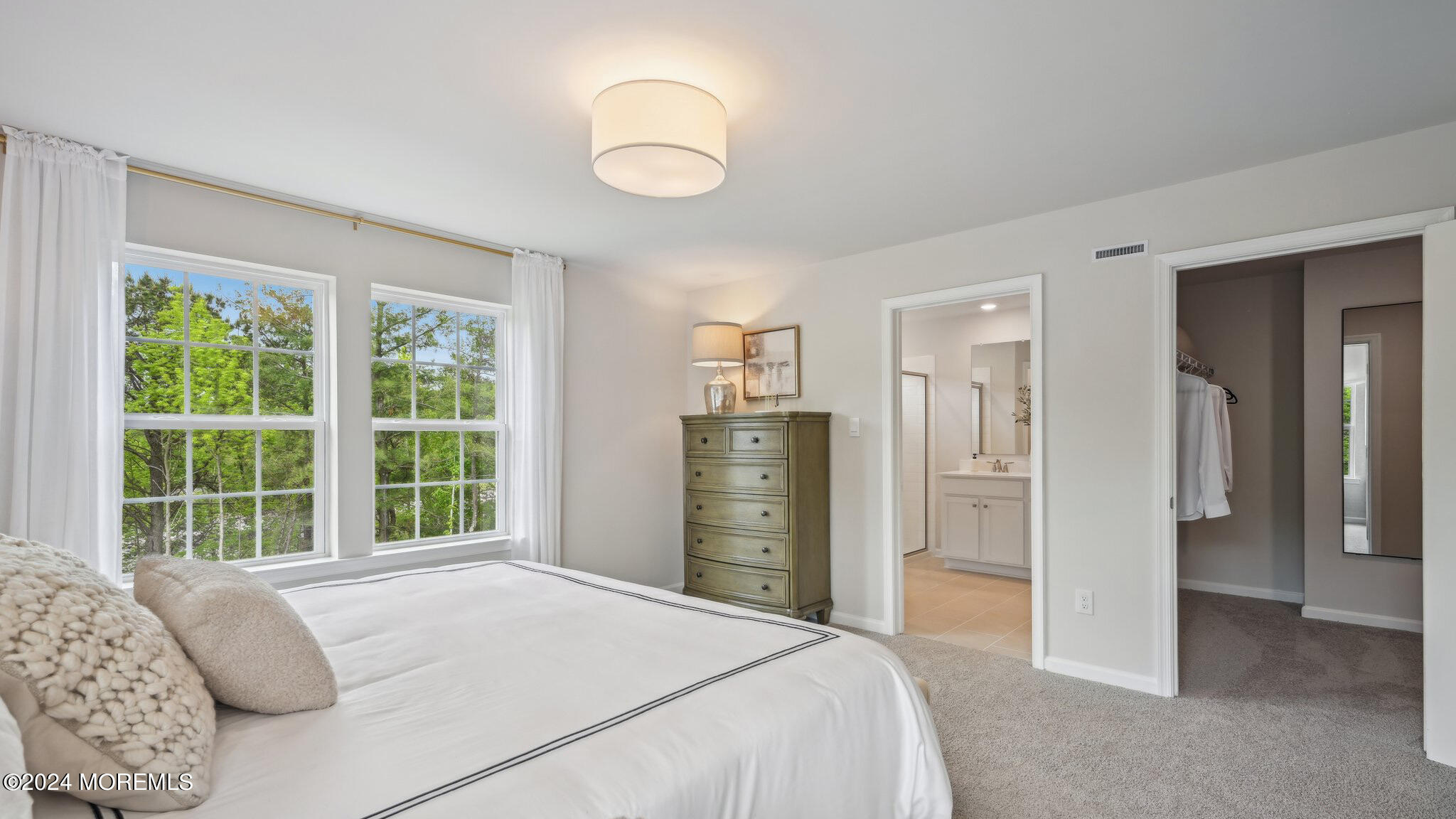 16 Rothbury Court Tinton Falls, NJ 07753 - Photo 33 of 43 a bedroom with a bed closet and a large window