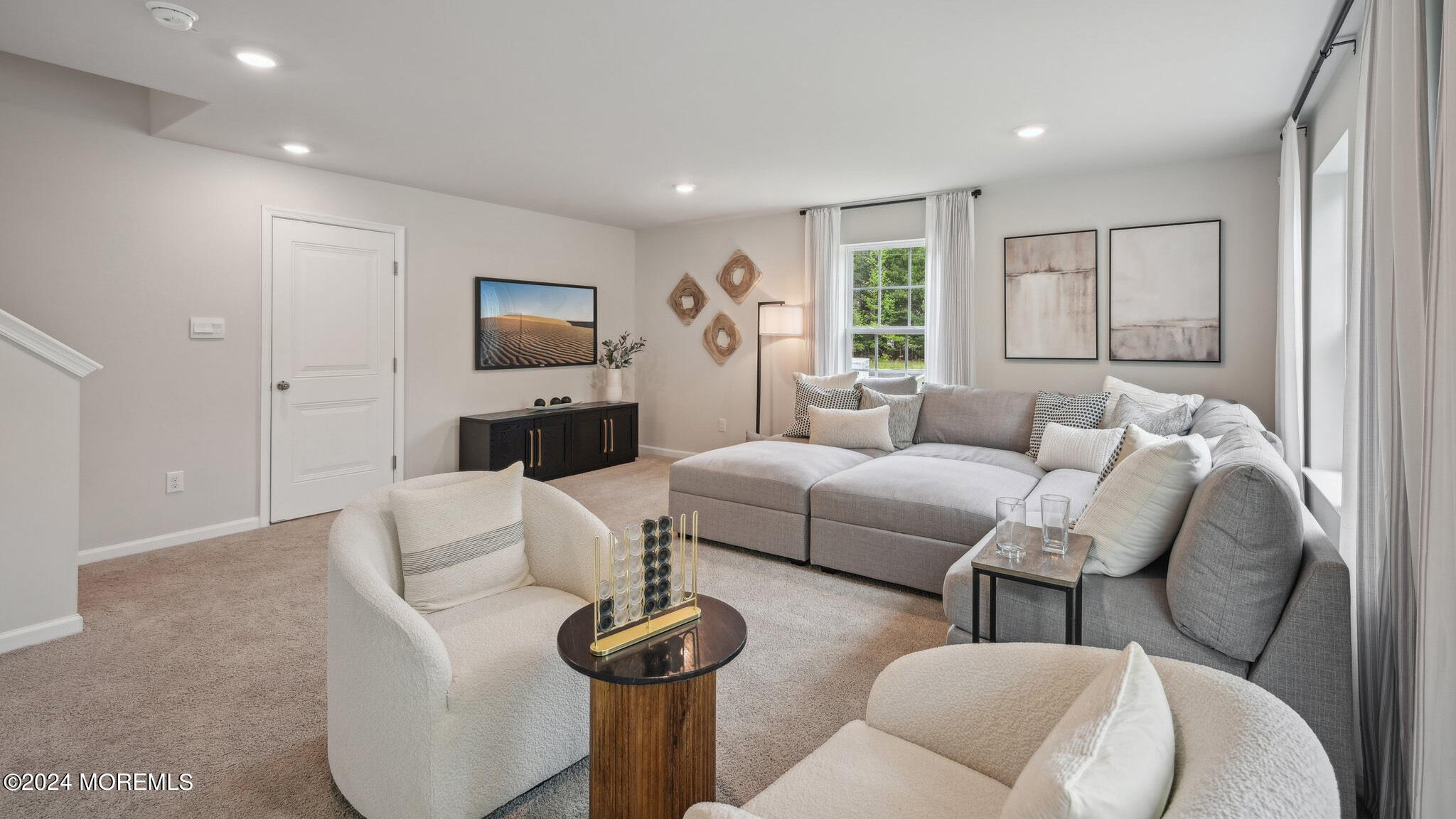 16 Rothbury Court Tinton Falls, NJ 07753 - Photo 7 of 43 a living room with furniture and a flat screen tv