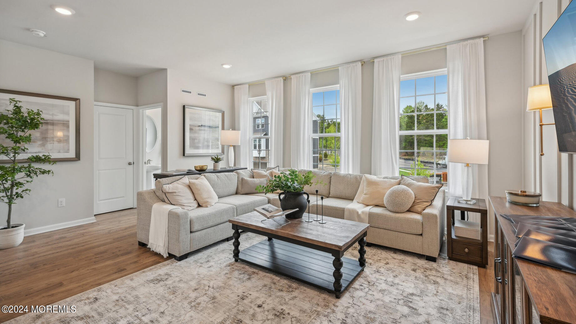 16 Rothbury Court Tinton Falls, NJ 07753 - Photo 9 of 43 a living room with furniture and a large window