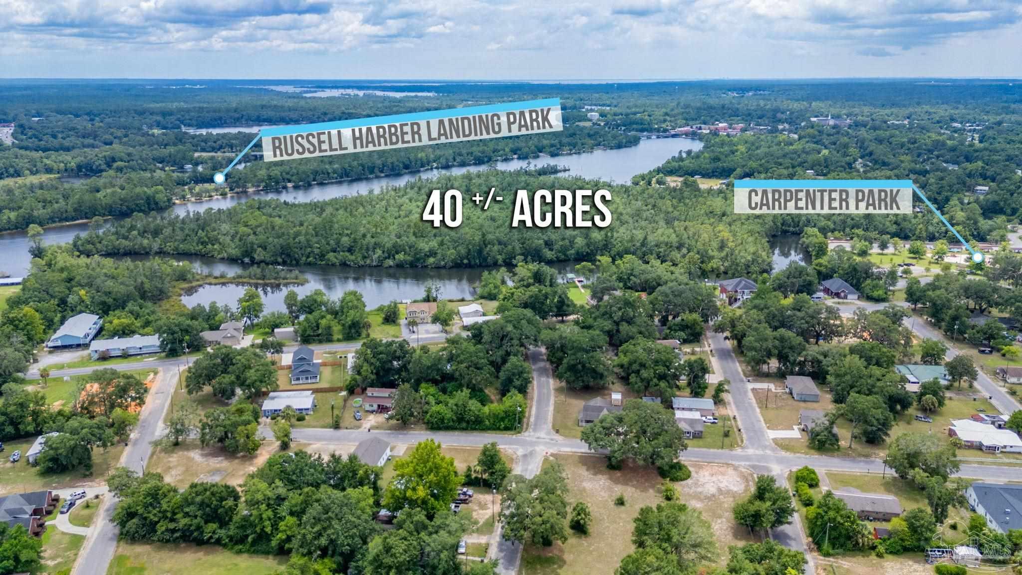 0 Broad Street Milton, FL 32570 - Photo 15 of 36 a view of a sign in a city