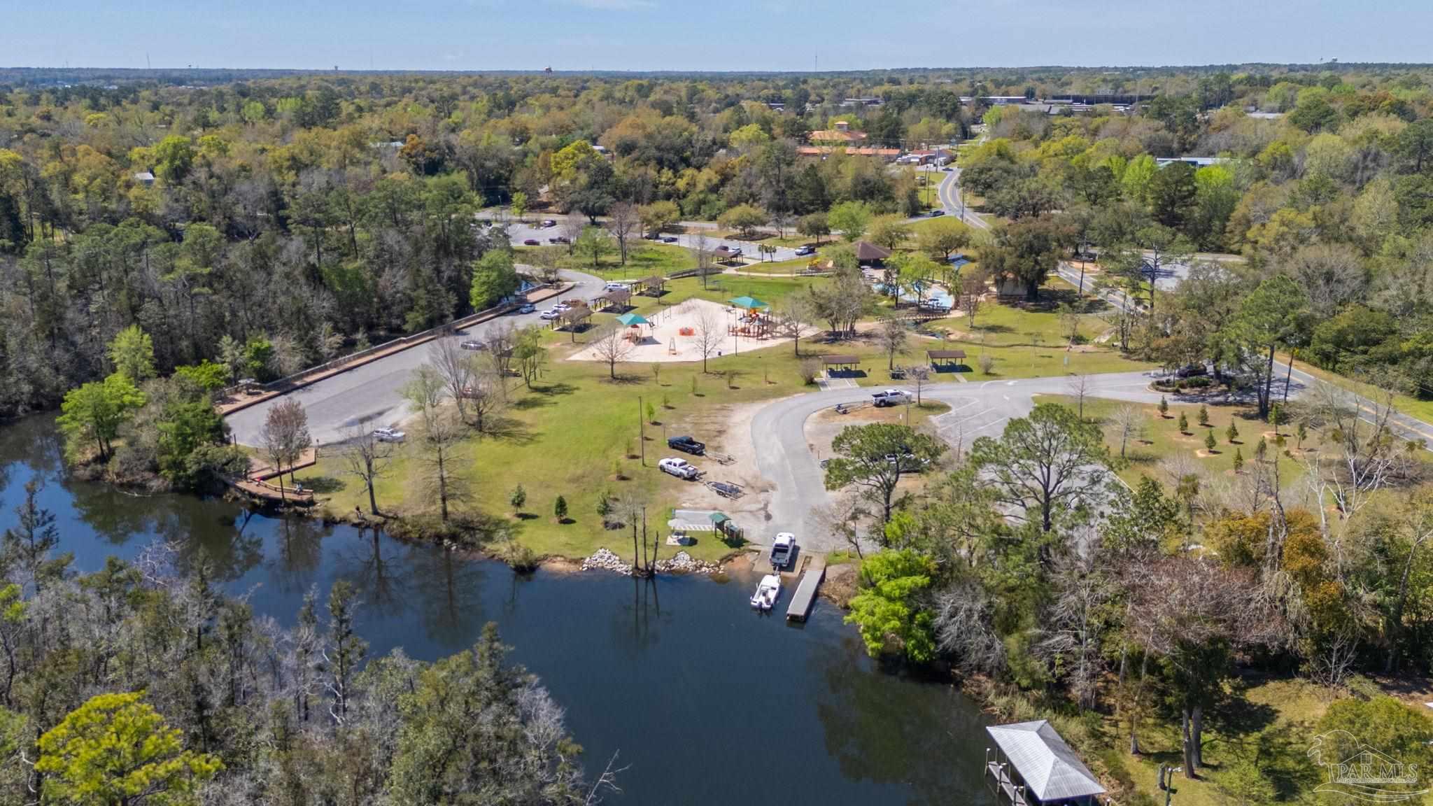 0 Broad Street Milton, FL 32570 - Photo 16 of 36 an aerial view of residential houses with outdoor space