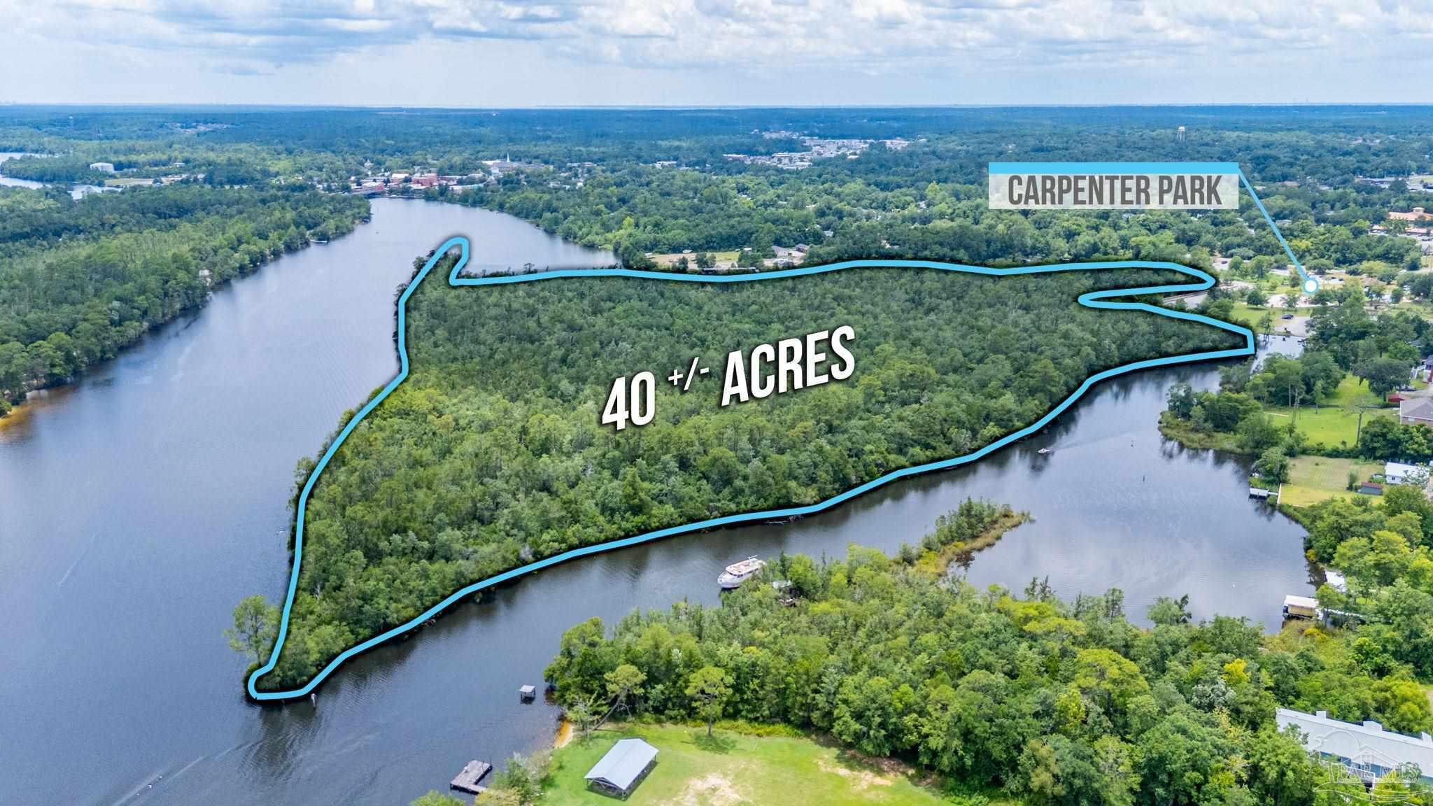 0 Broad Street Milton, FL 32570 - Photo 8 of 36 an aerial view of a city