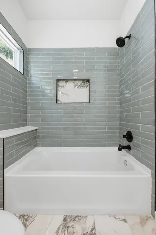 a bathroom with a bathtub