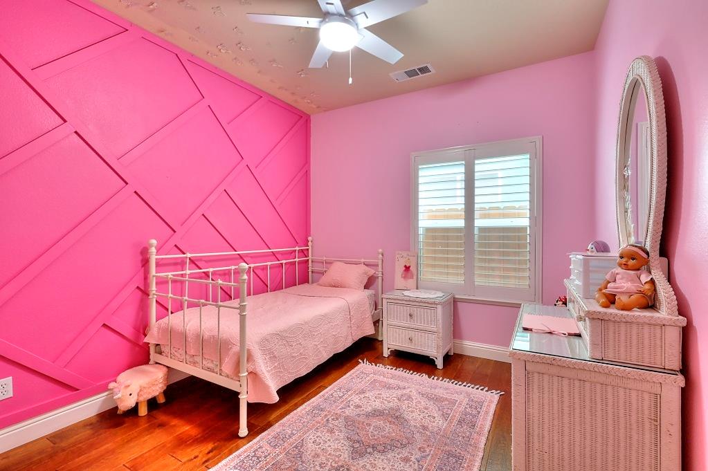 4152 Post Oak Drive Turlock, CA 95382 - Photo 48 of 71 a bedroom with a bed and a window