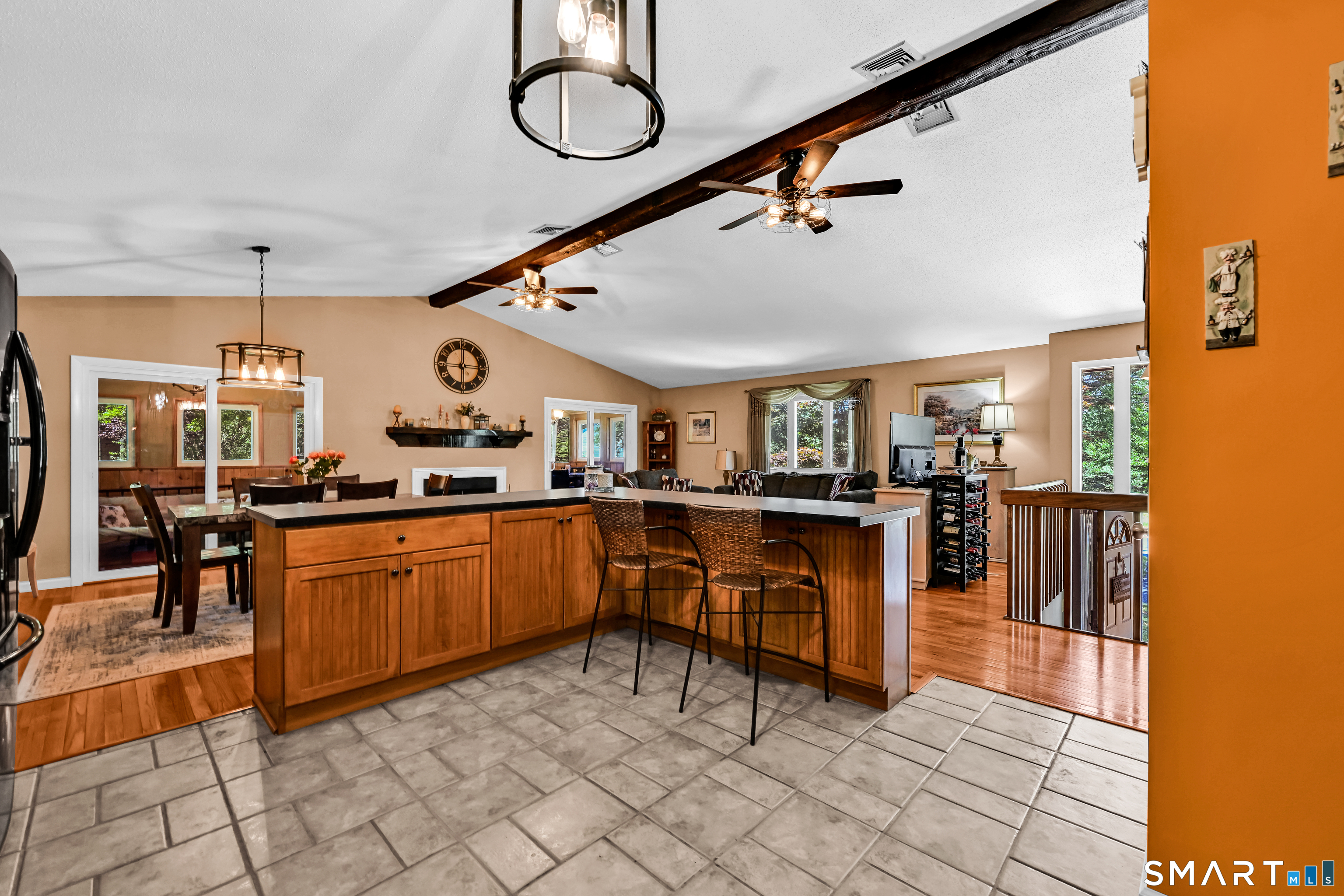 93 Court Street Cromwell, CT 06416 - Photo 5 of 38 Kitchen, living room and dining room with vaulted ceilings