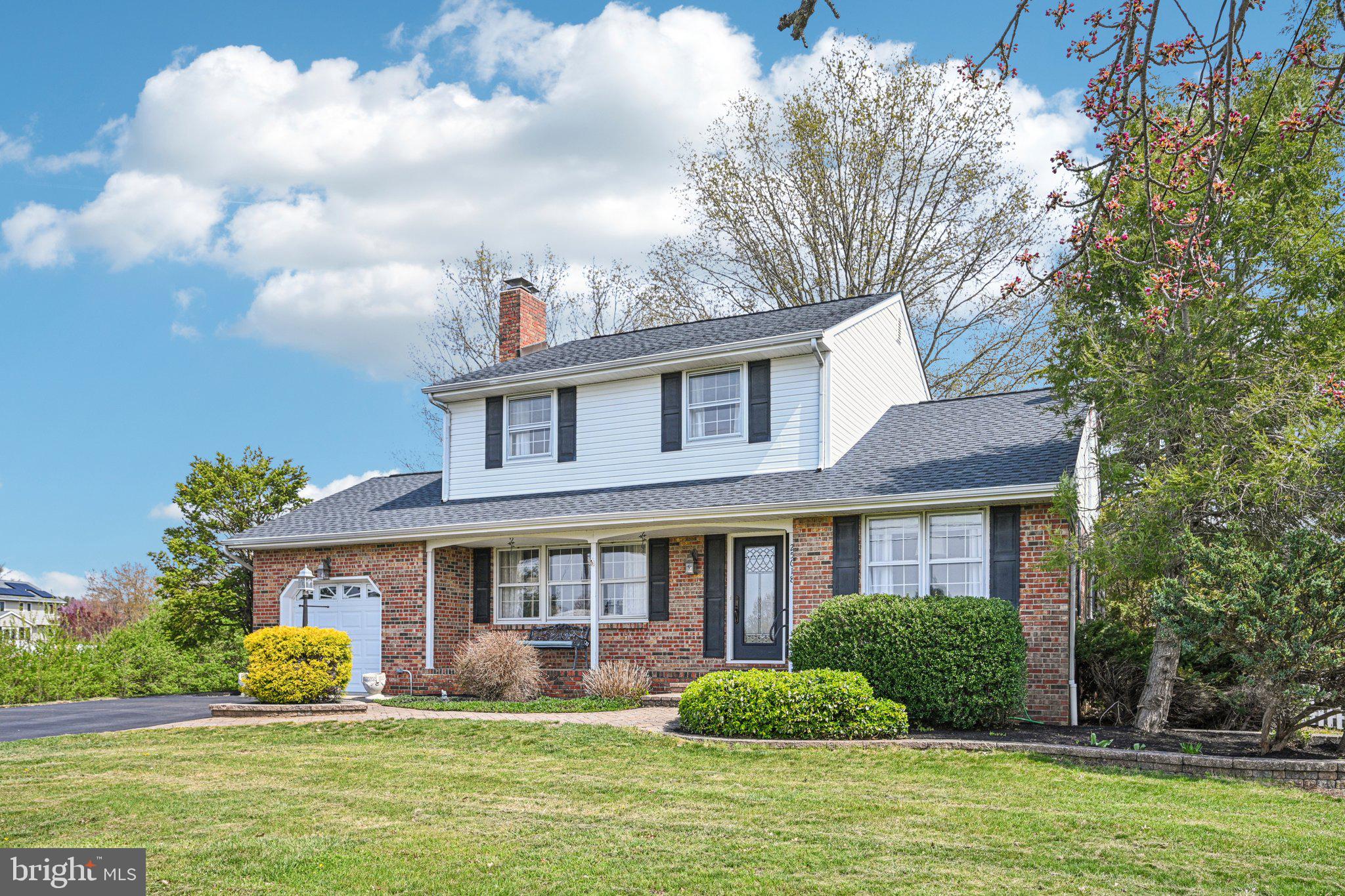 25618 Mt Pleasant Road Columbus, NJ 08022 - Photo 60 of 61 a front view of a house with garden and trees