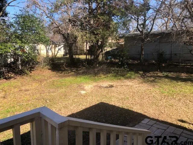 a view of a backyard that has toilet