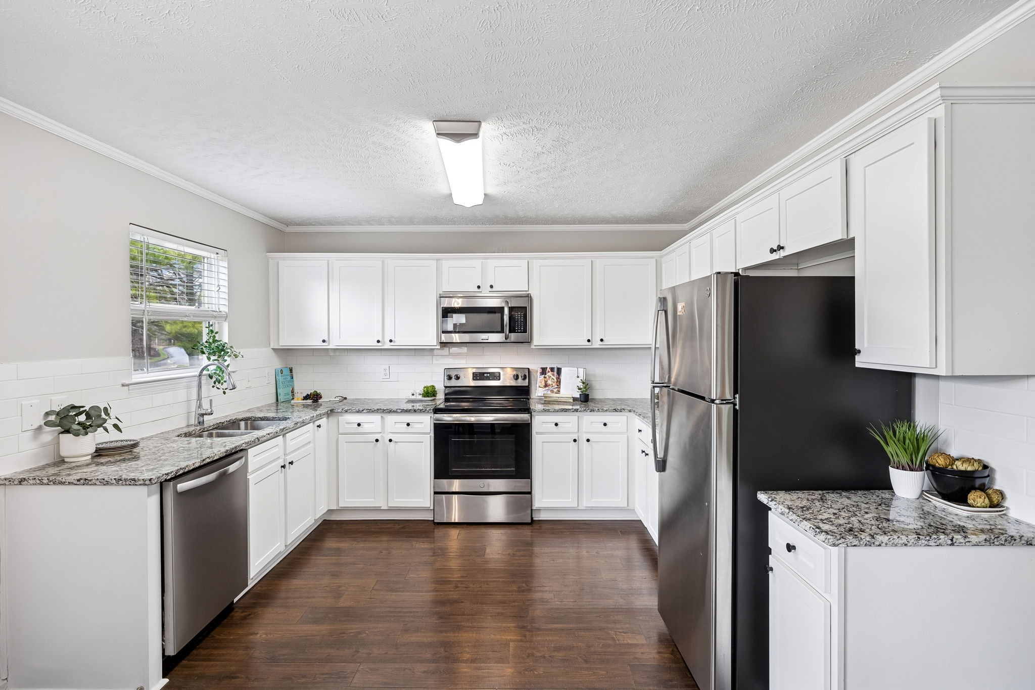 5807 Roxbury Drive Murfreesboro, TN 37128 - Photo 27 of 99 a kitchen with stainless steel appliances granite countertop a refrigerator sink and stove