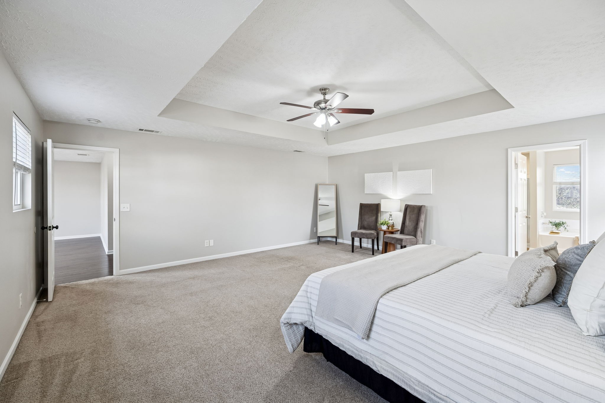 5807 Roxbury Drive Murfreesboro, TN 37128 - Photo 41 of 99 a bedroom with a large bed and a chandelier