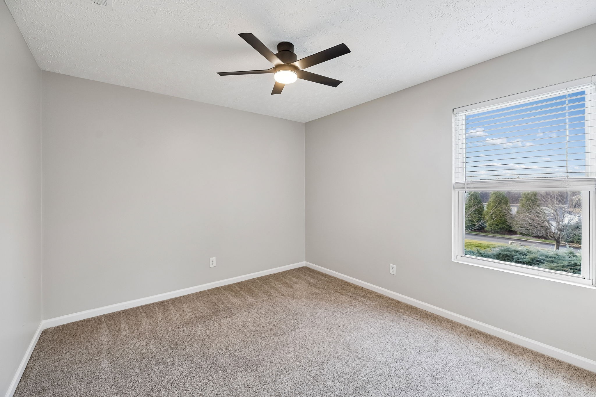5807 Roxbury Drive Murfreesboro, TN 37128 - Photo 51 of 99 an empty room with window and ceiling fan