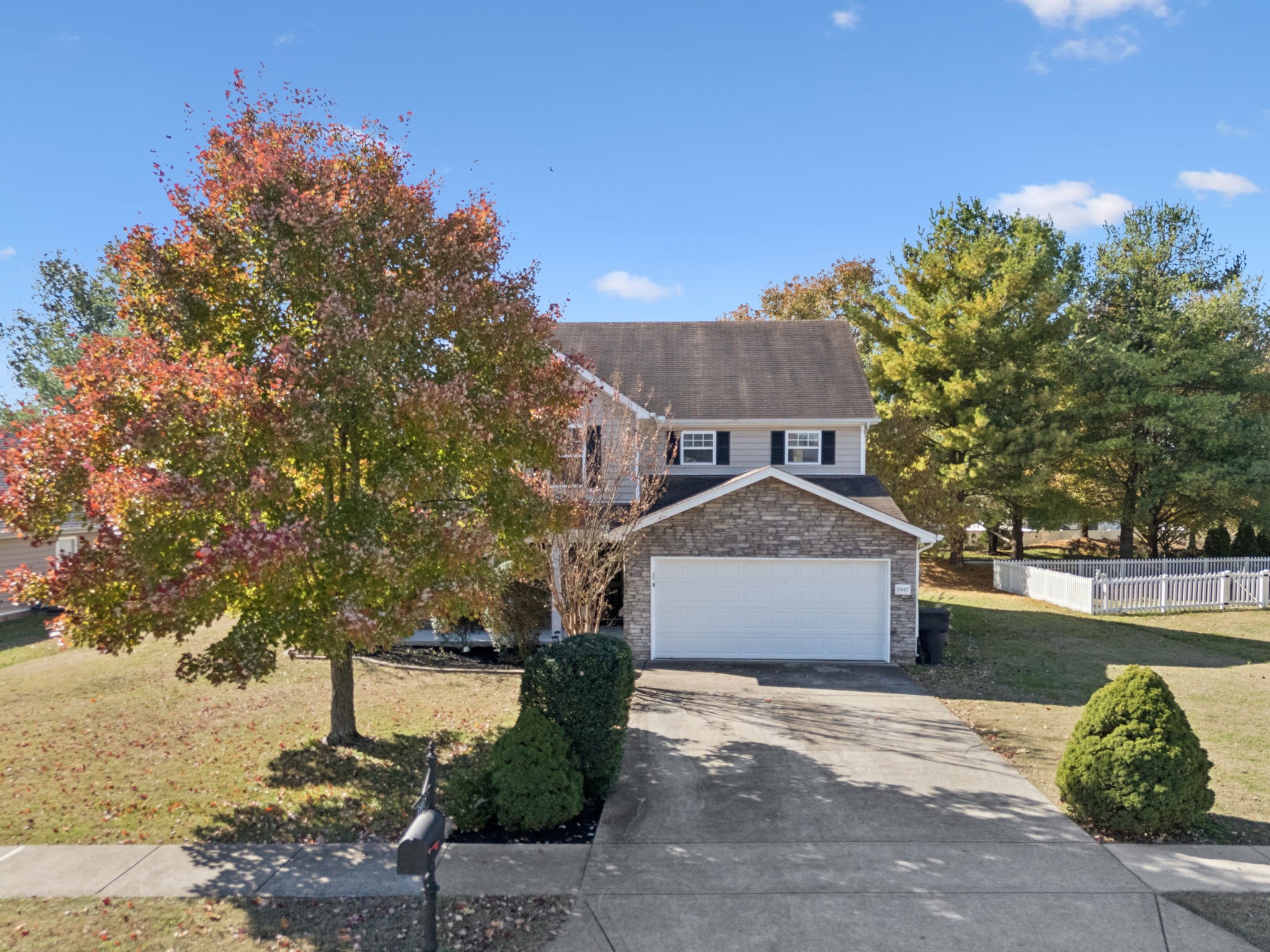 5807 Roxbury Drive Murfreesboro, TN 37128 - Photo 60 of 99 a front view of a house with a yard and garage