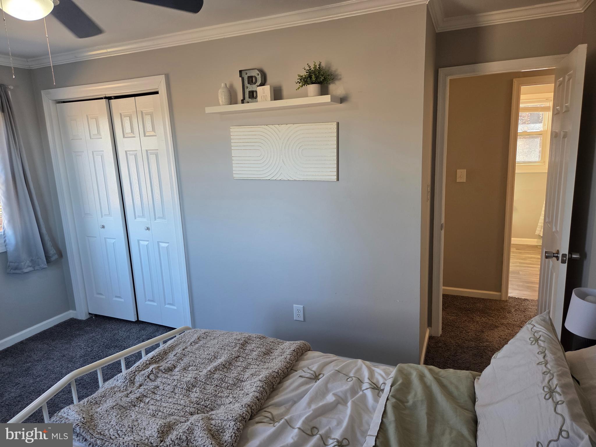 6327 Charles Cannon Road Marion Station, MD 21838 - Photo 17 of 23 a bedroom with a bed and a window