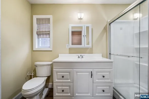 a utility room with a sink washer and dryer