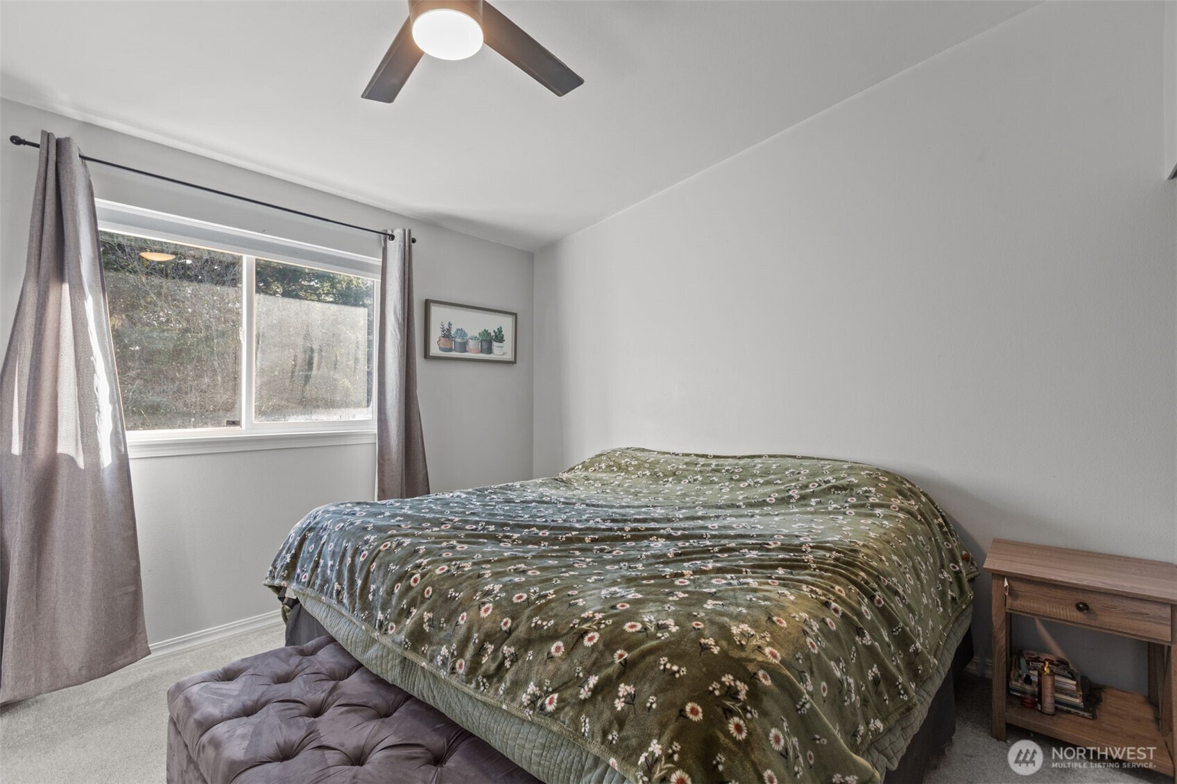20911 Ronning Road Arlington, WA 98223 - Photo 15 of 40 a bedroom with a bed and a window