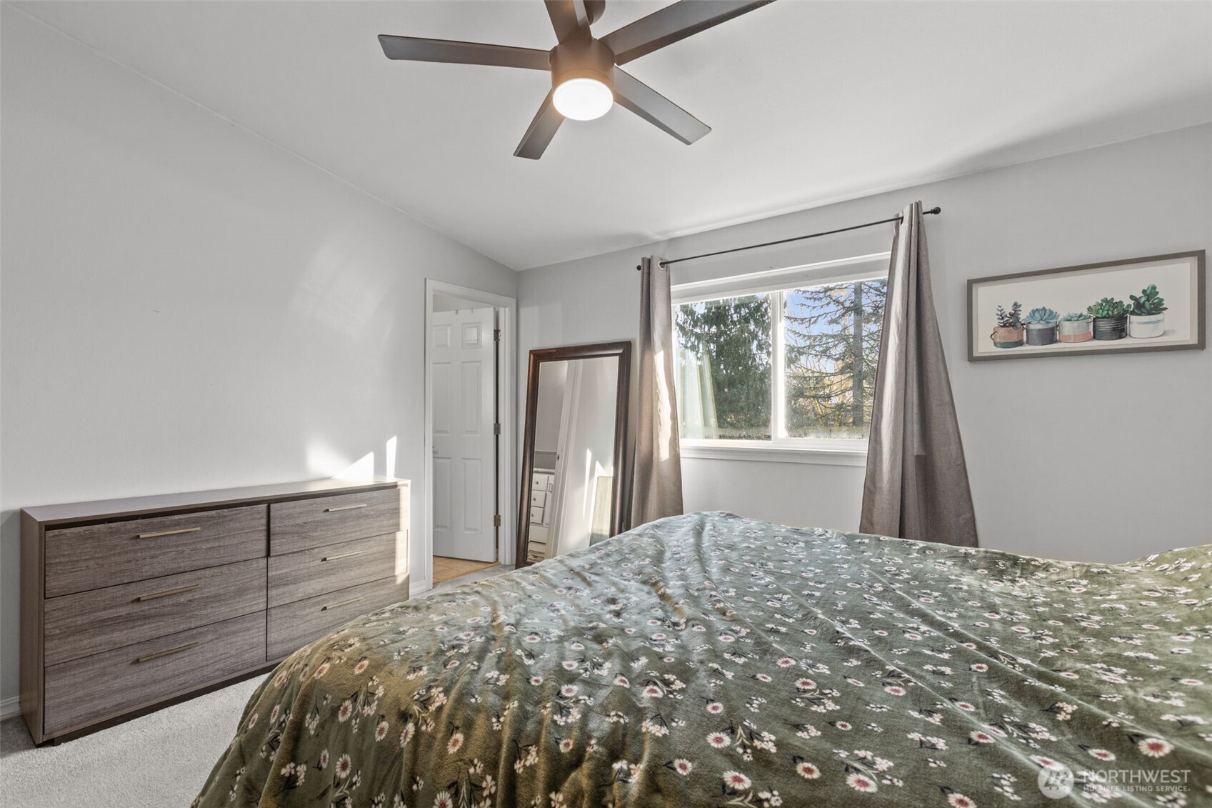 20911 Ronning Road Arlington, WA 98223 - Photo 16 of 40 a bedroom with a bed and a window